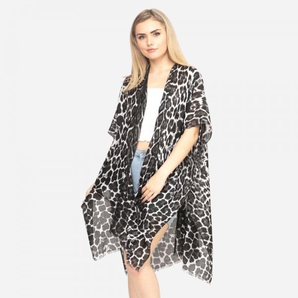 Women's Lightweight Sheer Leopard Print Kimono.

- One size fits most 0-14
- Approximately 37" L
- 100% Polyester