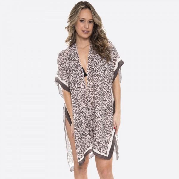 Women's Lightweight Pleated Leopard Print Kimono.

- One size fits most 0-14
- Approximately 37" L
- 100% Polyester