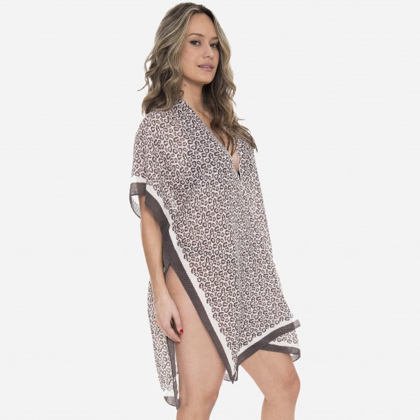 Women's Lightweight Pleated Leopard Print Kimono.

- One size fits most 0-14
- Approximately 37" L
- 100% Polyester