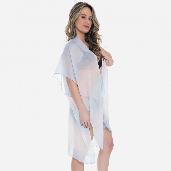 Women's Lightweight Sheer Ombre Kimono.

- One size fits most 0-14
- Approximately 35" L
- 100% Viscose