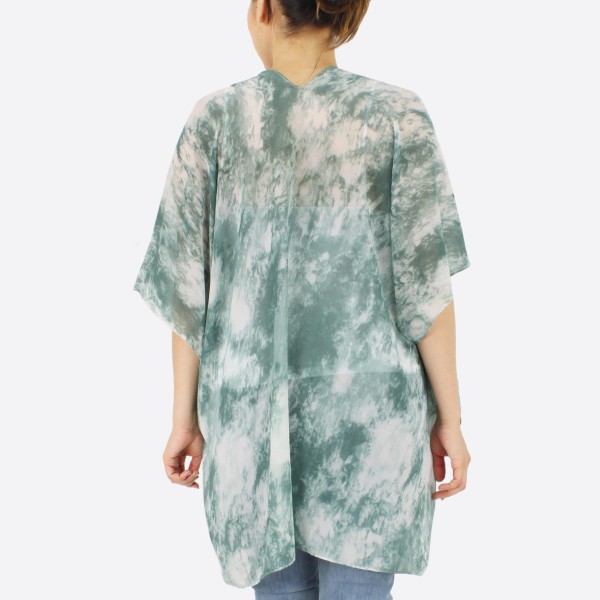 Women's lightweight sheer marble tie-dye short kimono.

- One size fits most 0-14
- Approximately 29" L
- 100% Polyester