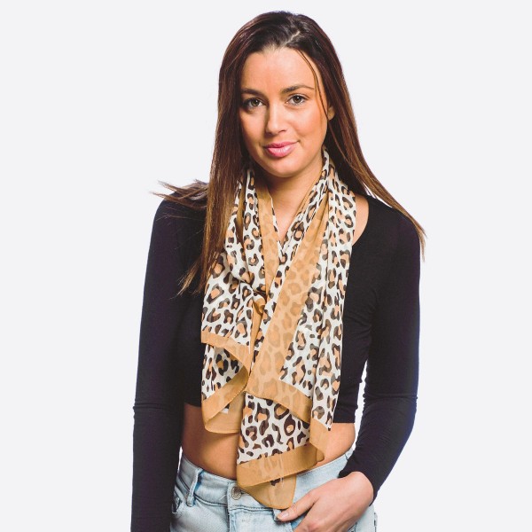 Women's lightweight sheer leopard print scarf.

- Approximately 20" W x 60" L
- 100% Polyester