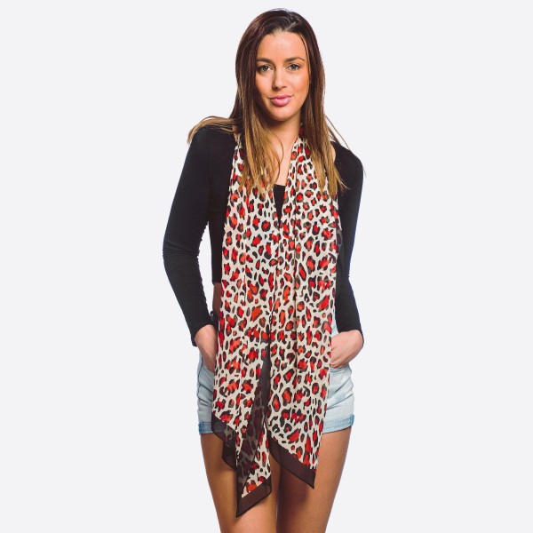 Women's lightweight sheer leopard print scarf.

- Approximately 20" W x 60" L
- 100% Polyester