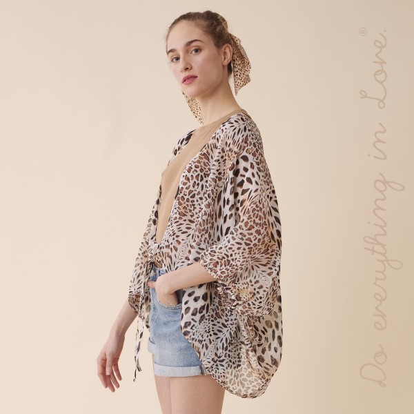 Do everything in Love Brand Women's Lightweight Sheer Leopard Print Crop Kimono with Front Tie Detail.

- Front tie closure
- One size fits most 0-14
- Approximately 25" L
- 100% Polyester