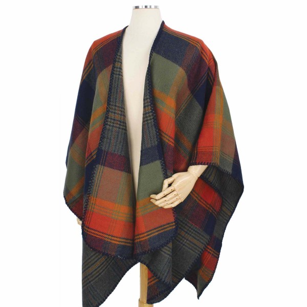 Fall/Winter Reversible Plaid Cape/Ruana.

- One size fits most 0-14
- Approximately 35" L 
- 100% Acrylic 
