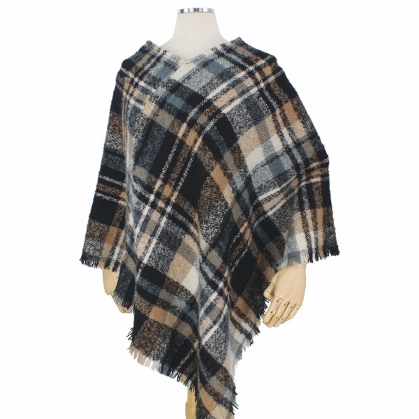 Fall/Winter Plaid Woven Poncho.

- One size fits most 0-14
- Approximately 33" L 
- 100% Polyester