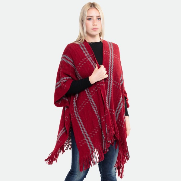 Houndstooth Knit Plaid Winter Ruana Featuring Tassel Trim.

- One size fits most 0-14
- Approximately 32" L 
- 100% Acrylic 