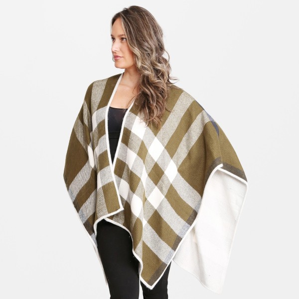 Women's Plaid Ruana.

- One size fits most 0-14
- Approximately 35" L
- 100% Acrylic 