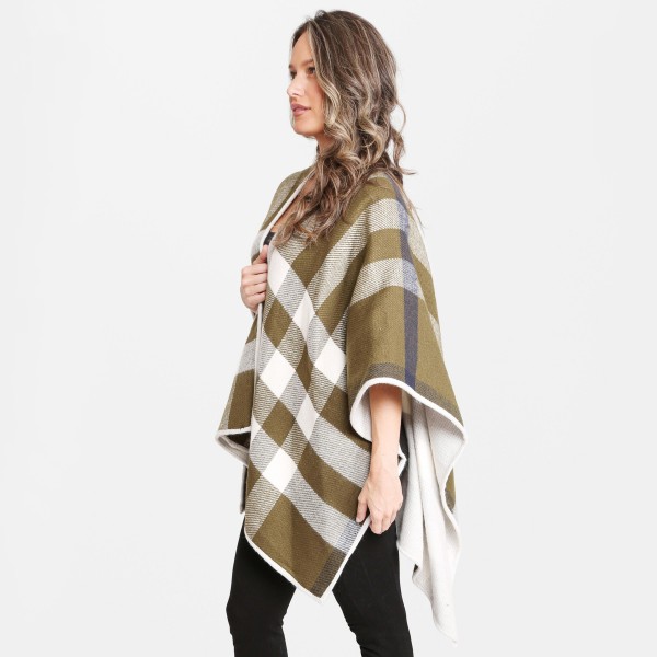 Women's Plaid Ruana.

- One size fits most 0-14
- Approximately 35" L
- 100% Acrylic 