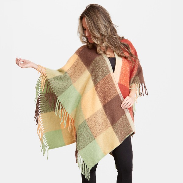 Women's Oversized Fleece Plaid Ruana Featuring Fringe Tassels Trim.

- One size fits most 0-14
- Approximately 33" L 
- 100% Acrylic