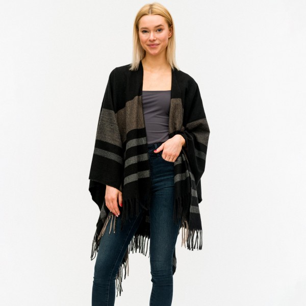 Women's Black Fleece Plaid Wrap/Ruana Featuring Fringe Tassels.

- One size fits most 0-14
- Approximately 33" Long
- 100% Polyester 
