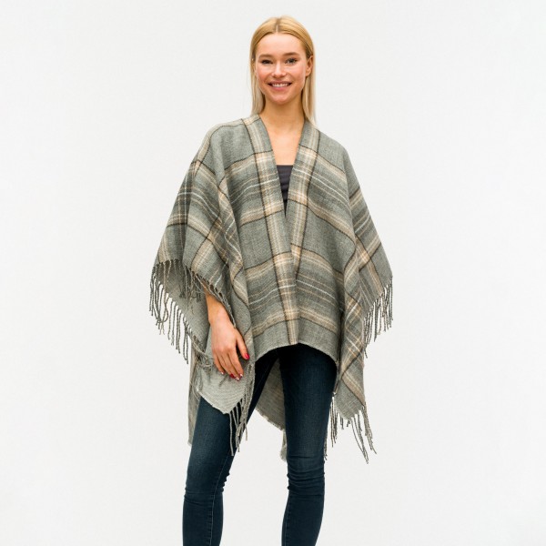 Plaid Ruana Featuring Fringe Details. 

- One Size Fits Most 0-14
- 100% Acrylic 
