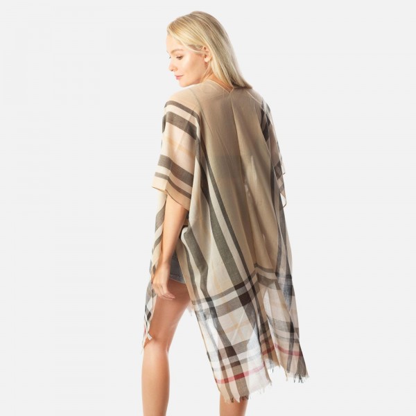 Women's Lightweight Burberry Plaid Kimono.

- One size fits most 0-14
- Approximately 37" L 
- 100% Polyester235336
