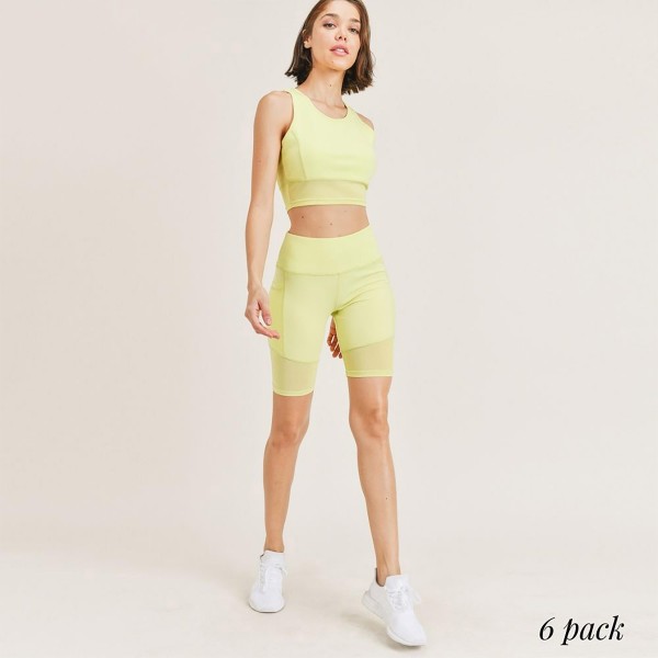 Women's Active Wear Matching Set. (6 Pack) Matching Set Includes Biker Shorts and Matching Crop Top. 

- 4" Elastic Waistband Biker Shorts 
- Mesh Like Details 
- 6 Sets Per Pack 
- Sizes: 1-S / 2-M / 2-L / 1-XL
- 92% Polyester / 8% Spandex 