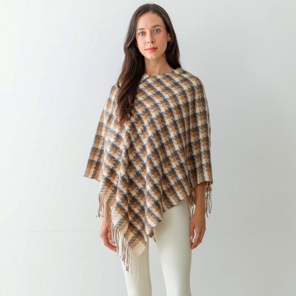 Women's Checkered Plaid Knit Poncho Featuring Tassel Edges.

- One Size Fits Most (Sizes 0-14)
- Approximately 40" in Length
- 100% Polyester