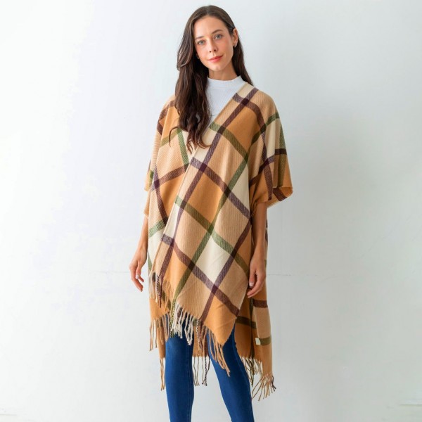 Women's Beige Plaid Knit Ruana Wrap Featuring Tassel Edges.

- One Size Fits Most (Sizes 0-14)
- Approximately 32" in Length
- 100% Polyester