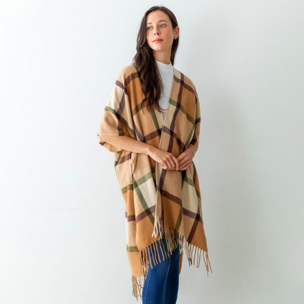 Women's Beige Plaid Knit Ruana Wrap Featuring Tassel Edges.

- One Size Fits Most (Sizes 0-14)
- Approximately 32" in Length
- 100% Polyester