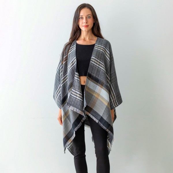 Women's Plaid Knit Ruana Wrap Featuring Fringe Edges.

- One Size Fits Most ( Sizes 0-14)
- Approximately 32" in Length
- 100% Polyester