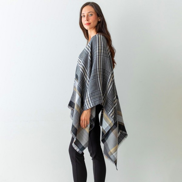Women's Plaid Knit Ruana Wrap Featuring Fringe Edges.

- One Size Fits Most ( Sizes 0-14)
- Approximately 32" in Length
- 100% Polyester