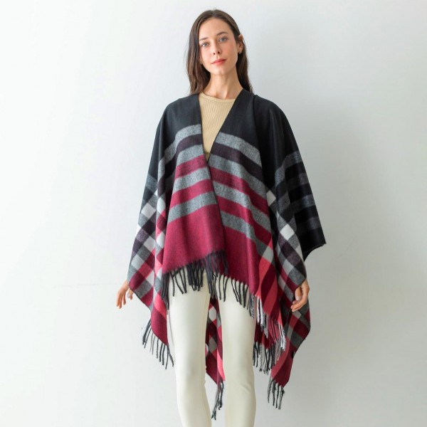Women's Plaid Fleece Ruana Wrap Featuring Tassel Edges.

- One Size Fits Most ( Sizes 0-14)
- Approximately 32" in Length
- 50% Polyester, 50% Viscose