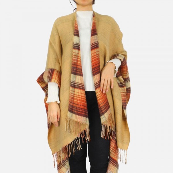Reversible Plaid kimono featuring fringe tassels
-One size fits most
-100% Acrylic