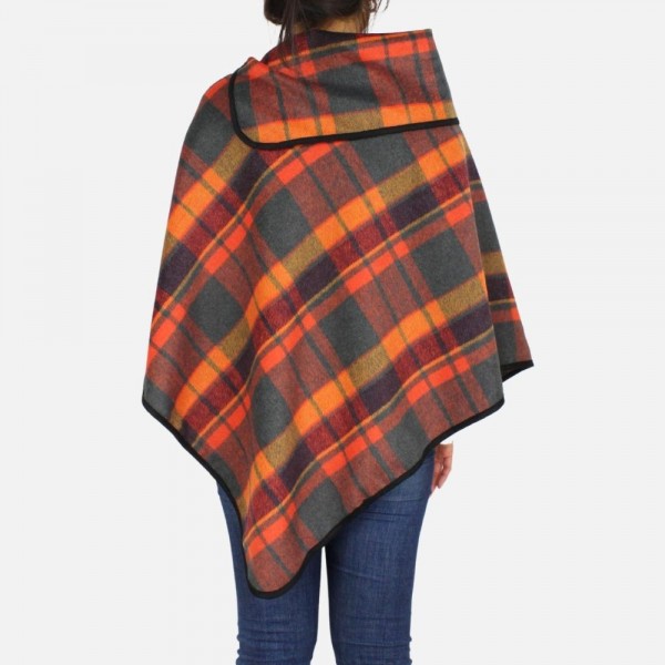 Plaid poncho featuring cowl neck and button details
-Can be worn two ways
-One size fits most 0-14
-100% Polyester