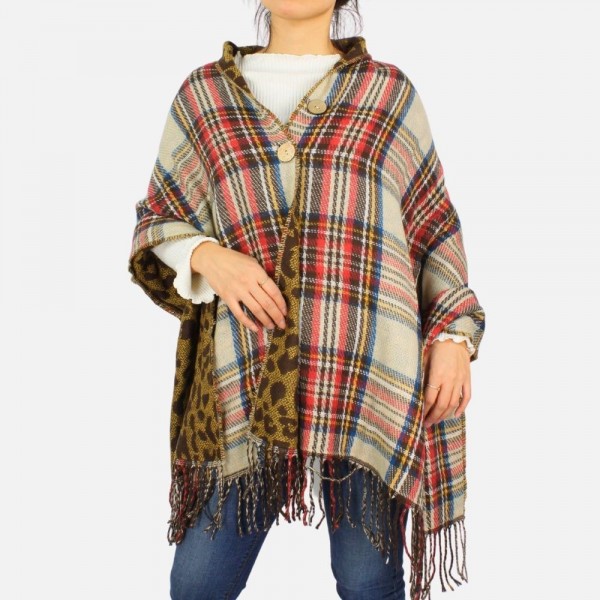 Convertible and reversible poncho with fringe tassel and button details.
-Reverses from plaid to animal print
-One size fits most 0-14
-100% Acrylic