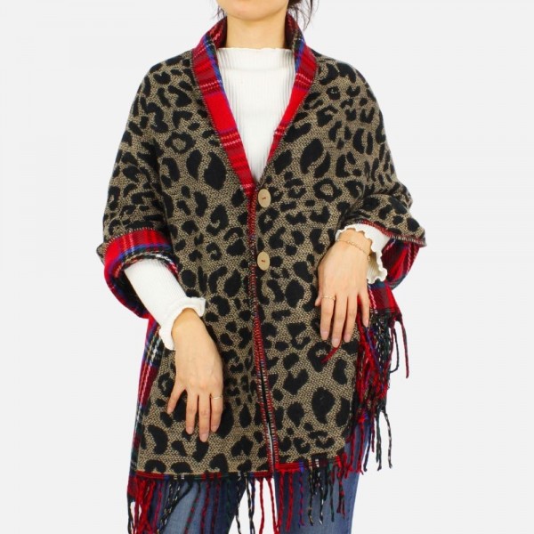 Convertible and reversible poncho with fringe tassel and button details.
-Reverses from plaid to animal print
-One size fits most 0-14
-100% Acrylic