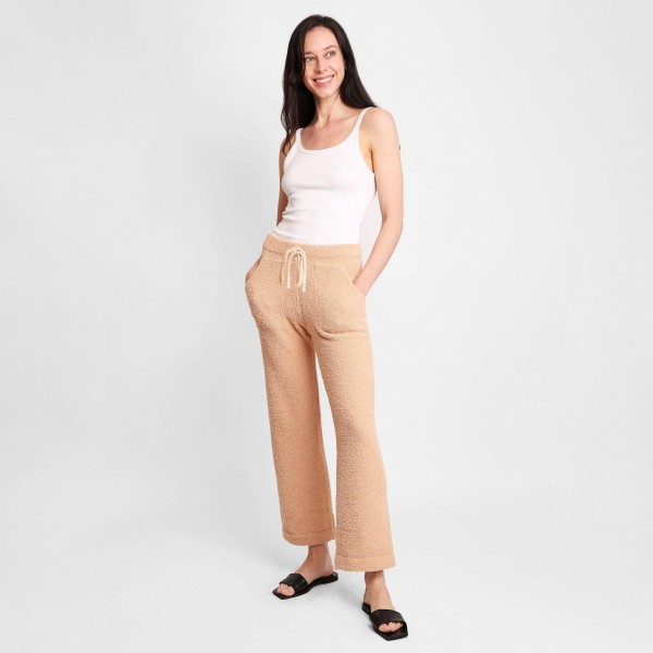 Women's Wide Leg Drawstring Lounge Pants 

• Size: S/M (Sizes 2-8)
• Approximately 41" in Length
• 29" Inseam 
• 100% Polyester 
• Drawstring high-rise waistband 
• Two pockets for keeping your hands warm
• Wide leg silhouette
• Soft and comfortable fabric with stretch
• Comfortable, relaxed fit
• Flare hem
• Style with your favorite tee for a laid-back look
• Soft and stretchy
• Comfortable for lounging at home