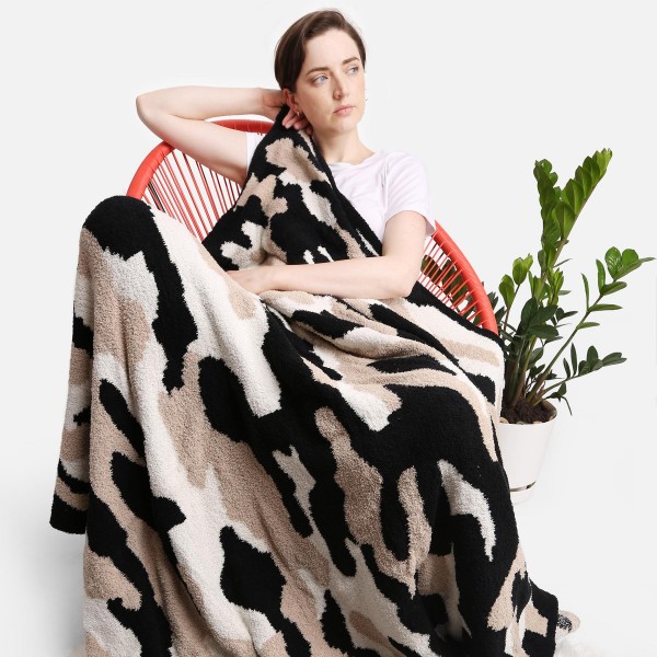 Super Soft Jacquard Camouflage Comfy Luxe Knit Blanket. The Softest Throw Blanket Made of the Highest Quality Material. So Soft You Have to Feel Them for Yourself. This Luxurious Throw is a Guaranteed Best Seller this Season! 

- Approximately 50" W x 60" L
-100% Polyester 
- Extra Plush and Cozy