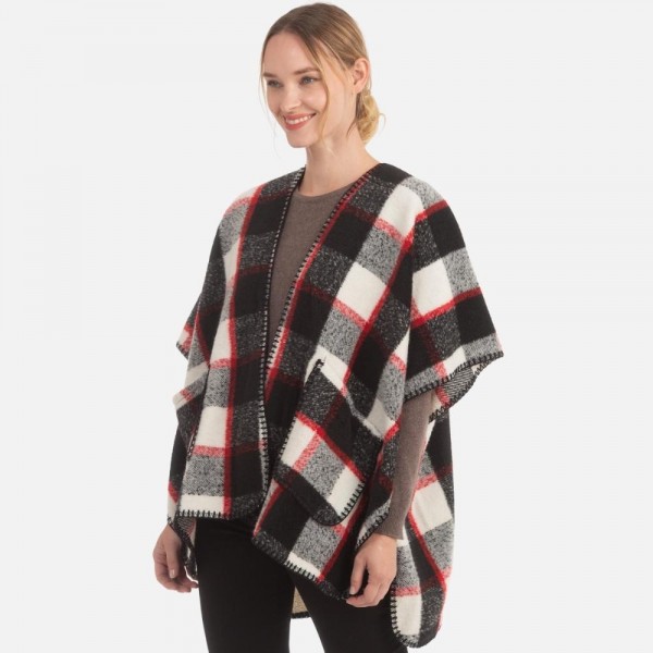 Plaid kimono with pockets

-One size fits most 0-14
-100% Acrylic