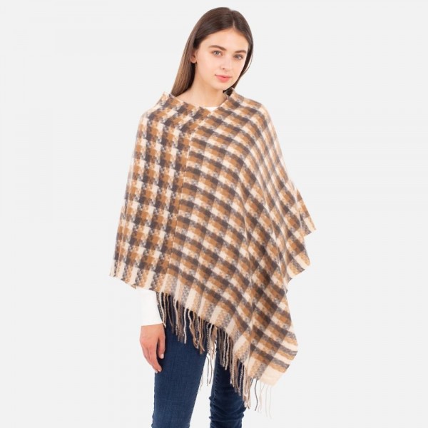 Women's Plaid Knit Poncho Featuring Fringe Accents.

- One Size Fits Most (Sizes 0-14)
- 100% Polyester