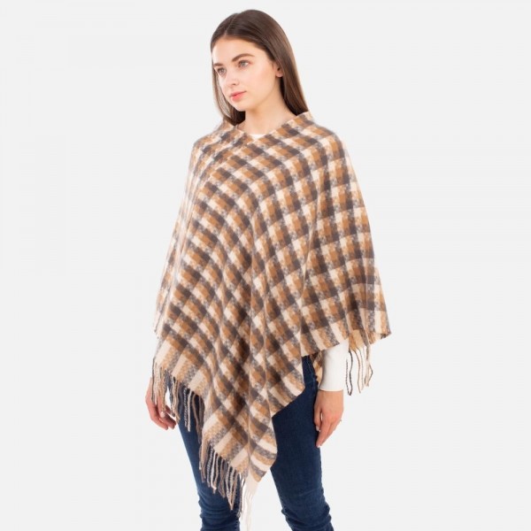 Women's Plaid Knit Poncho Featuring Fringe Accents.

- One Size Fits Most (Sizes 0-14)
- 100% Polyester