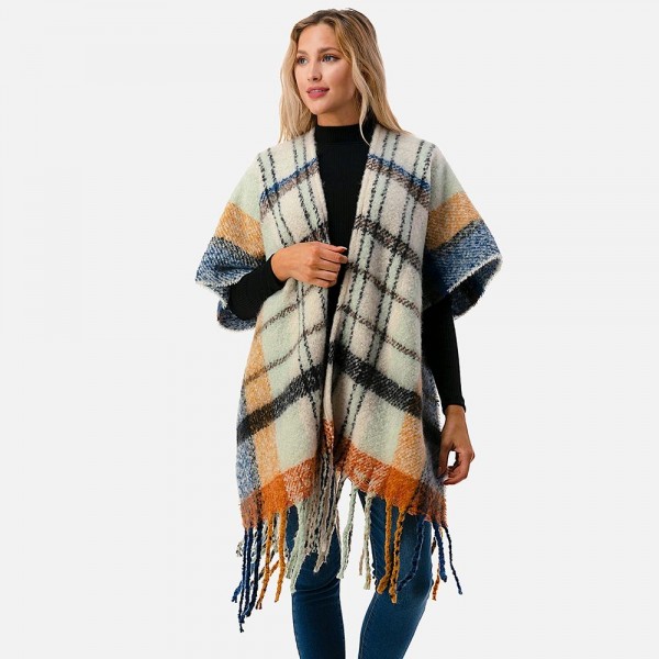 Soft Fuzzy Knit Plaid Pattern Ruana Wrap Featuring Tassel Hem

-  One Size Fits Most 0-14
- 100% Polyester