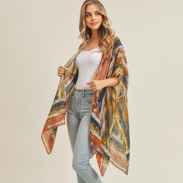 Lightweight Linear Detail Print Kimono

- One size fits most (0-14)
- Approximately 37" in Length
- 100% Polyester