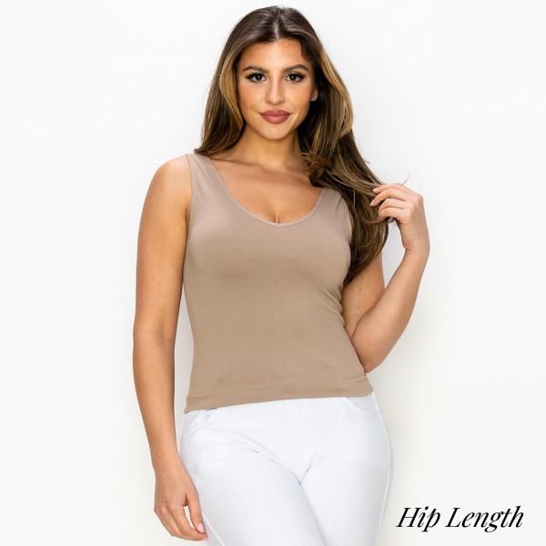 Lady's Seamless Hip Length Tank With Reversible Neckline

- Sits at Hip Length
- One Size Fits Most
- Wide shoulder straps
- V-neckline
- Back scoop neck
- Fitted silhouette
- Seamless design
- Buttery soft fabrication with stretch
- Pull on/off
- 92% Nylon / 8% Spandex