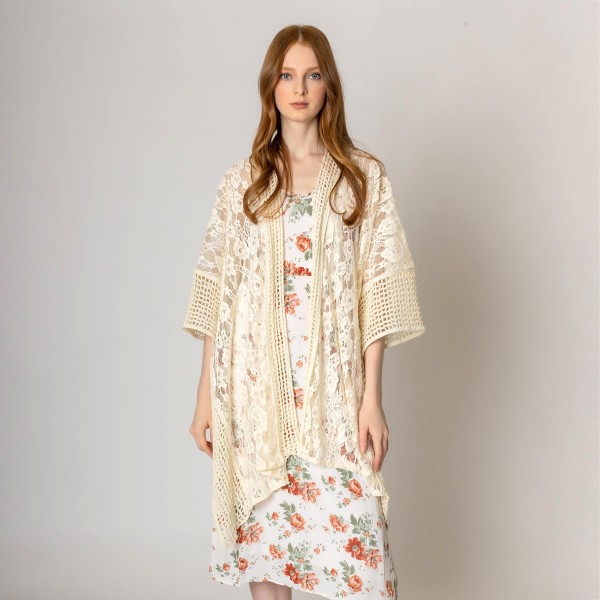 Floral Lace Knit Kimono.

- One Size Fits Most
- 100% Polyester