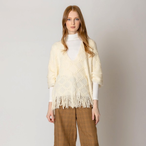 Do Everything In Love Knit Poncho With Fringe Tassel

-  One Size Fits Most 0-14
- 100% Acrylic