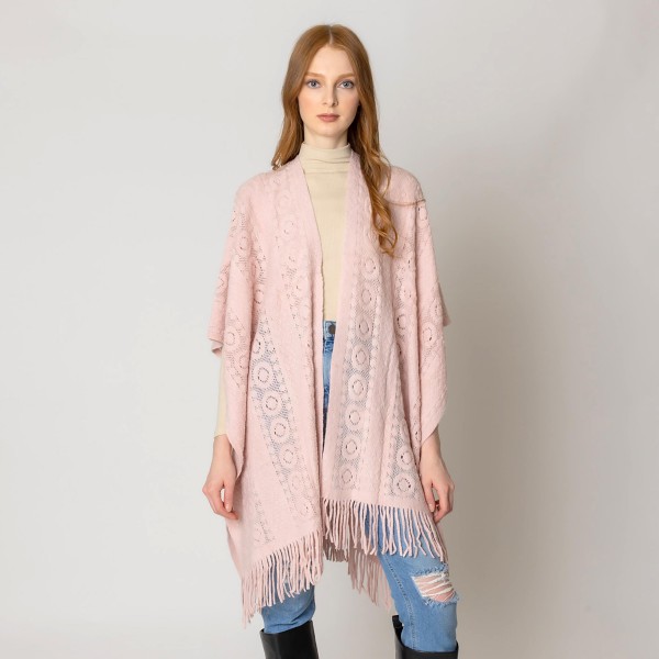 Solid Color Circle Pattern Knit Ruana Wrap Featuring Tassel Hem.

- One Size Fits Most 0-14
- 100% Acrylic