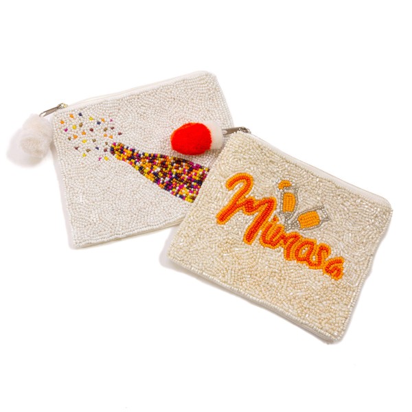 Canvas and Seed Bead Champagne Pouch With Pom Zipper.

- Zipper Closure
- Approximately 5.5" L x 4.5" T
- 100% Cotton