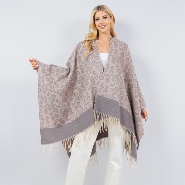 Soft Knit Leopard Print Kimono Ruana With Bold Contrast Stripe and Fringe Tassel

- One Size Fits Most 0-14
- 100% Polyester