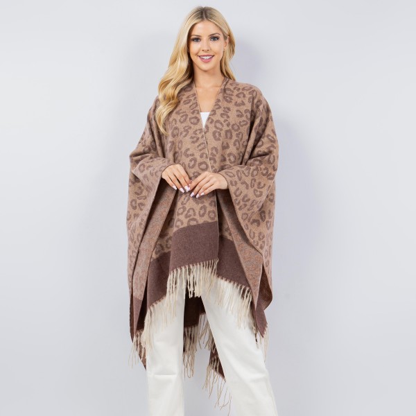 Soft Knit Leopard Print Kimono Ruana With Bold Contrast Stripe and Fringe Tassel

- One Size Fits Most 0-14
- 100% Polyester