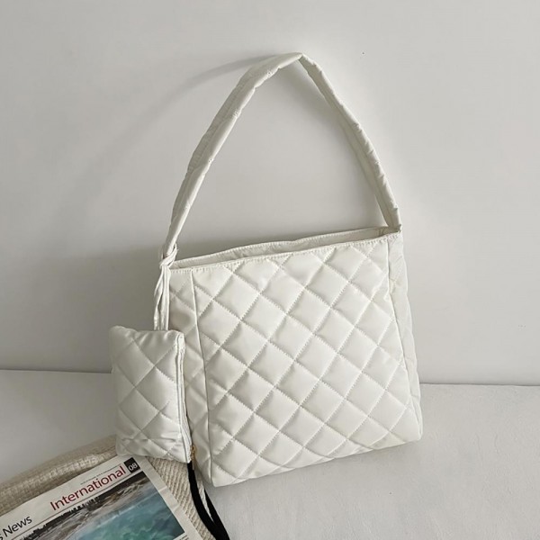 Quilted Puffer Tote Bag With Matching Wristlet 

- Full Zip Closure
- Lined
- Approximately 13.75"L x 13"H x 4.75"D  
- Wristlet 7.5" x 4.5"