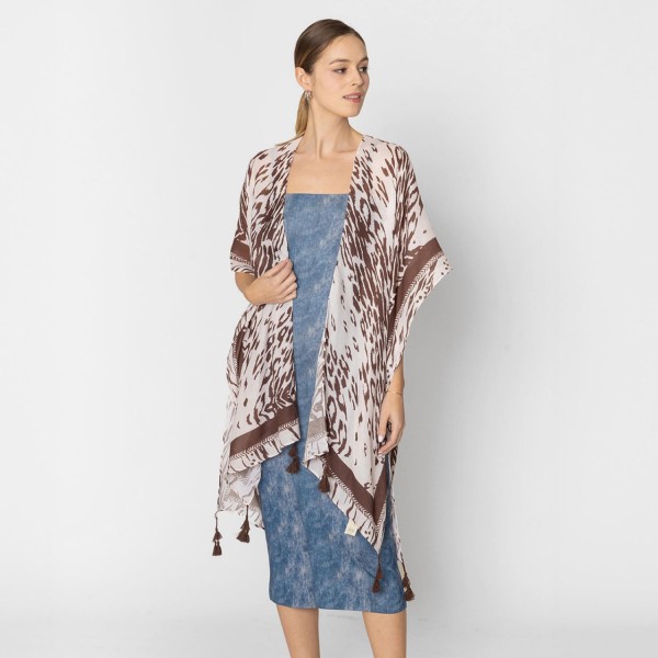 Do Everything In Love Animal Print Kimono With Tassel Details

- One Size Fits Most (0-14)
- 100% Polyester
