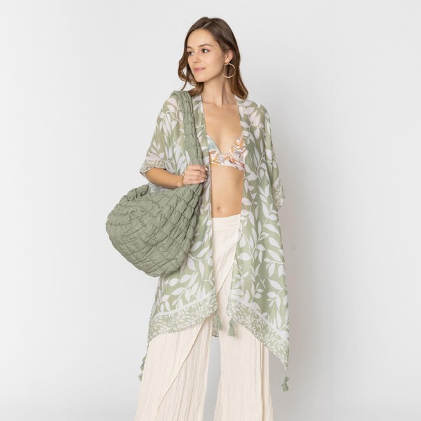 Do Everything In Love Leaf Printed Kimono With Tassel Details 

- One Size Fits Most (0-14)
- 100% Polyester 