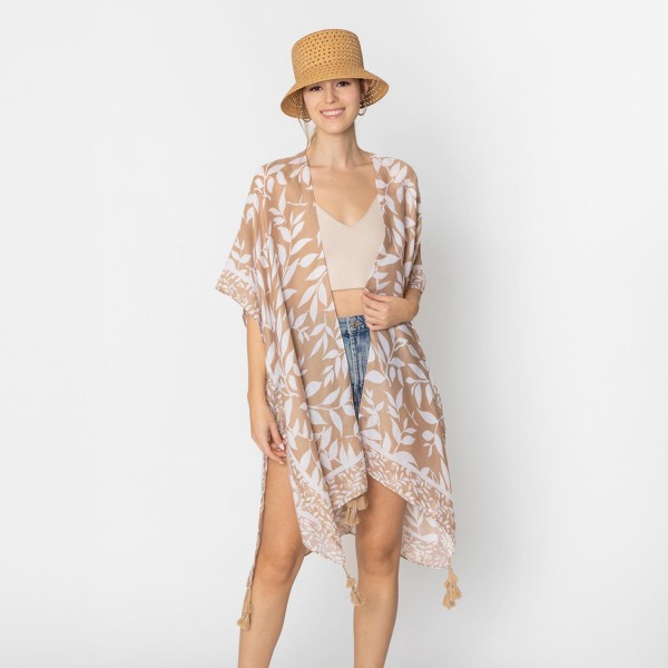 Do Everything In Love Leaf Printed Kimono With Tassel Details 

- One Size Fits Most (0-14)
- 100% Polyester 