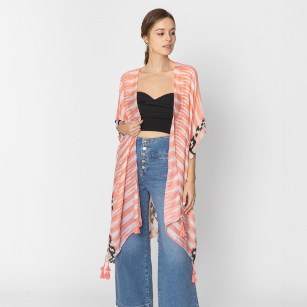 Do Everything In Love Aztec Print Kimono With Tassel Details

- One Size Fits Most (0-14)
- 100% Polyester