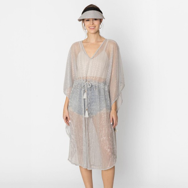 Do Everything In Love Pleated Metallic Poncho With Tassel Drawstring 

- One Size Fits Most (0-14)
- 100% Polyester