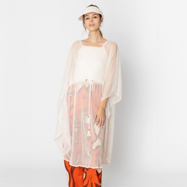 Do Everything In Love Pleated Metallic Poncho With Tassel Drawstring 

- One Size Fits Most (0-14)
- 100% Polyester