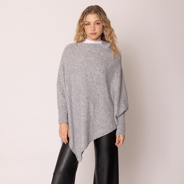 Do Everything In Love Knit Poncho With Batwing Sleeves 

- One Size Fits Most (0-14)
- 100% Recycled Polyester 